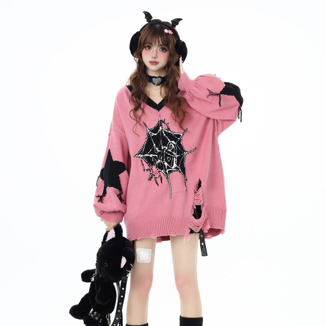 Relaxed V-neck knit sweater with paneling and mid-length design