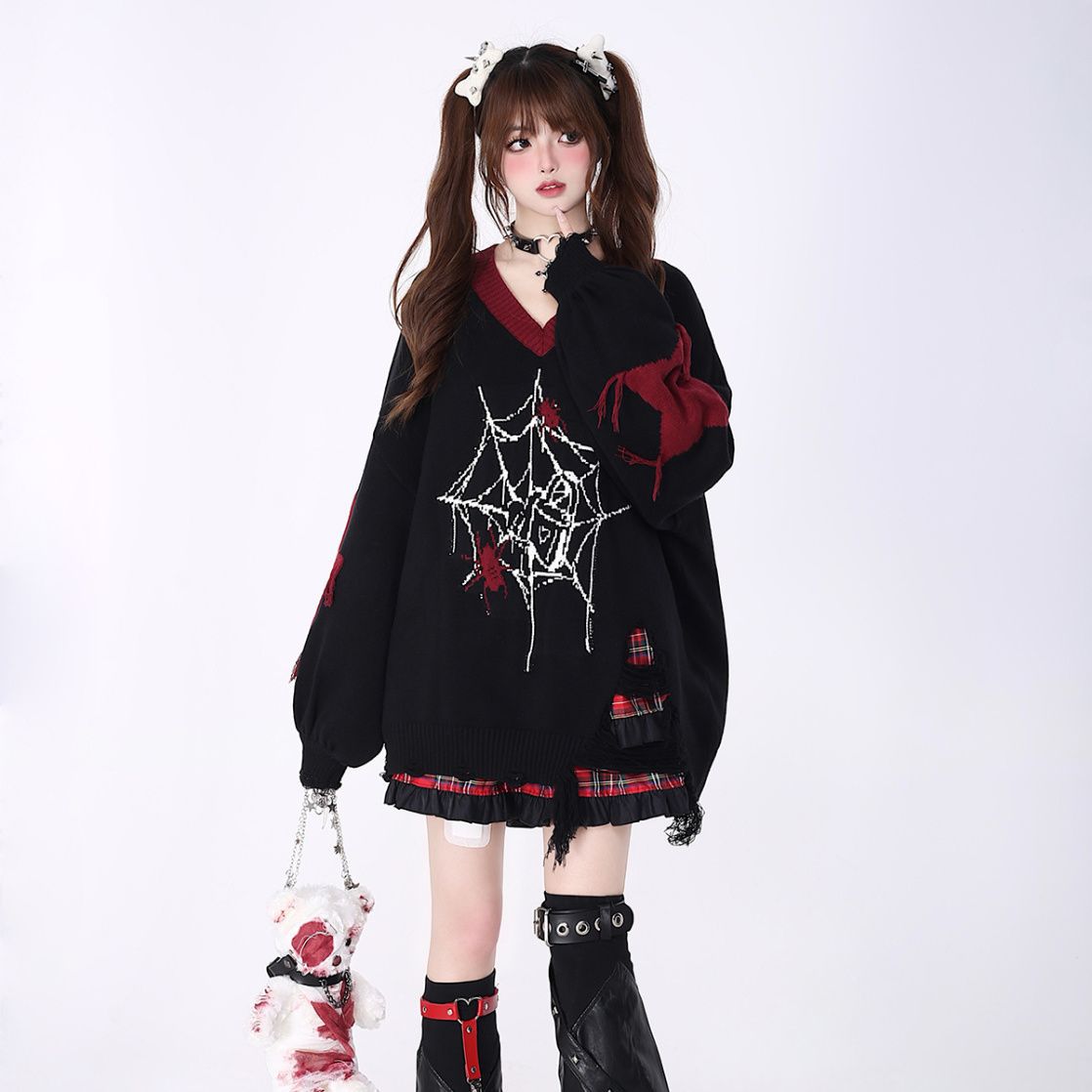 Relaxed V-neck knit sweater with paneling and mid-length design